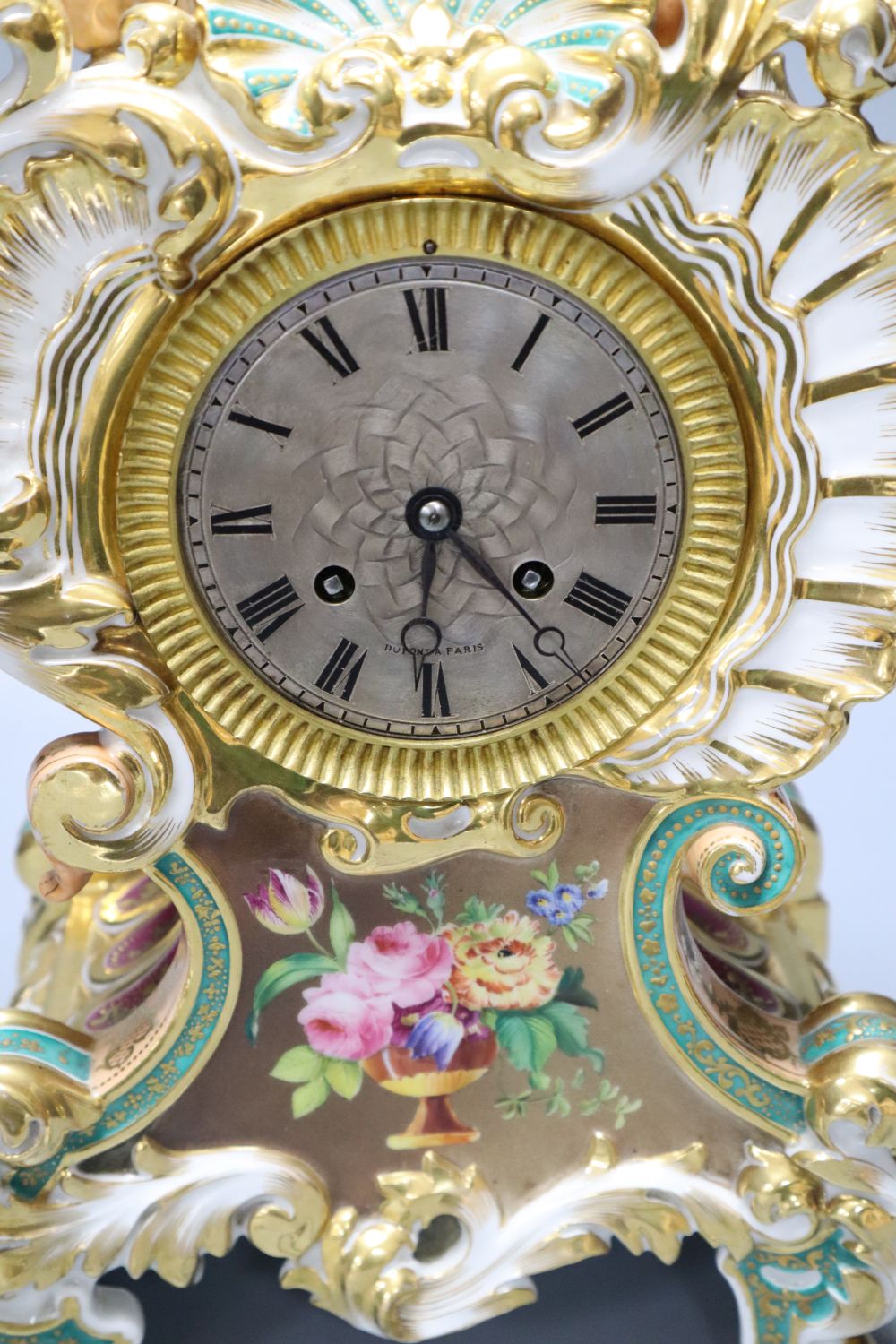 A late 19th century French porcelain mantel clock, with French movement, countwheel striking on a bell, height 40cm